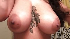 Big boobs girl brushing her teeth