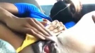 Masked Ebony fingering Clitoris